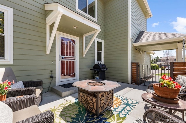 property entrance with a patio area