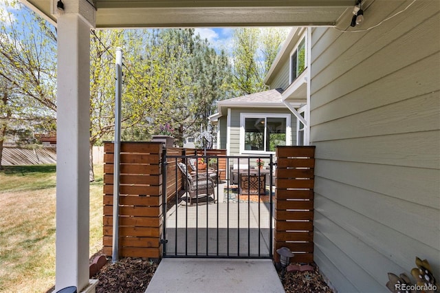 view of gate with fence