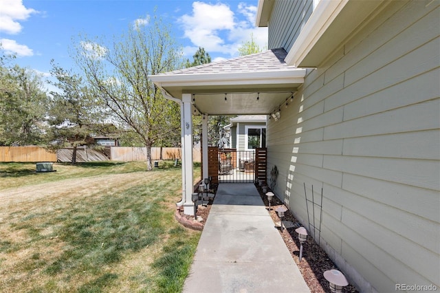 view of yard featuring a gate and fence