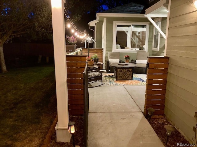 view of patio featuring an outdoor fire pit