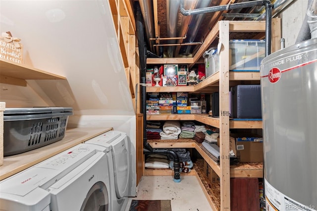 storage featuring water heater and washing machine and dryer
