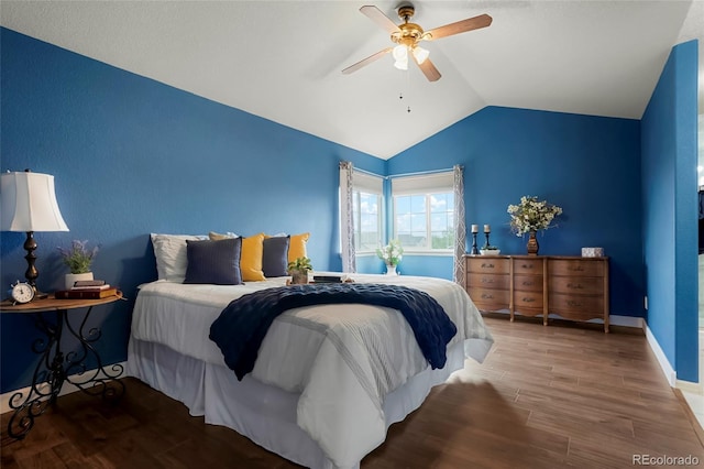 4873 Eckert St, Castle Rock, CO 80104 - bedroom featuring lofted ceiling, wood finished floors, a ceiling fan, and baseboards