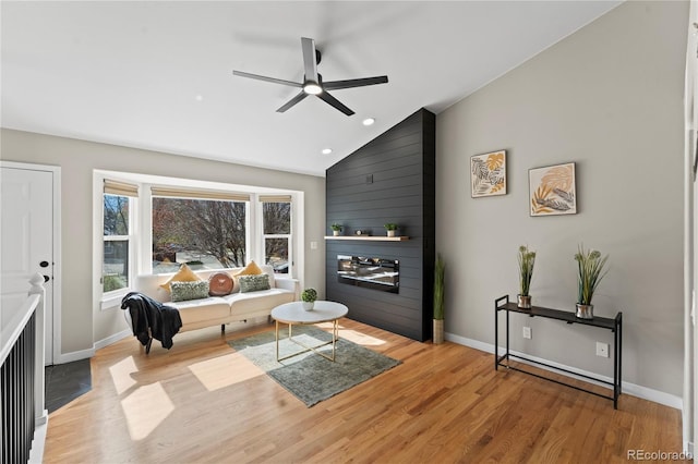 5965 Corinth Dr, Colorado Springs, CO 80923 - living room with lofted ceiling, a ceiling fan, wood finished floors, baseboards, and recessed lighting