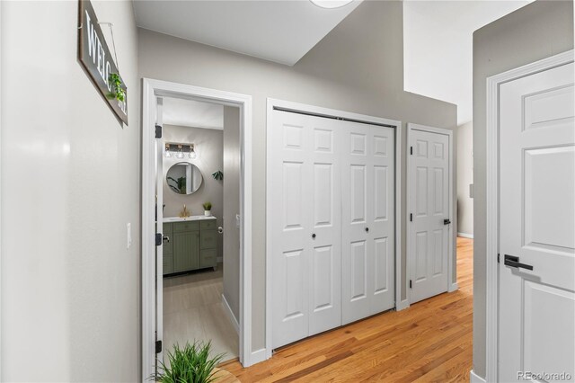 5965 Corinth Dr, Colorado Springs, CO 80923 - corridor with light wood-style floors and baseboards