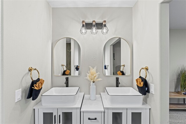 5965 Corinth Dr, Colorado Springs, CO 80923 - bathroom featuring double vanity