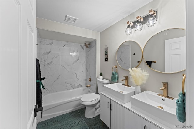 5965 Corinth Dr, Colorado Springs, CO 80923 - full bathroom featuring toilet, bathing tub / shower combination, double vanity, and tile patterned floors