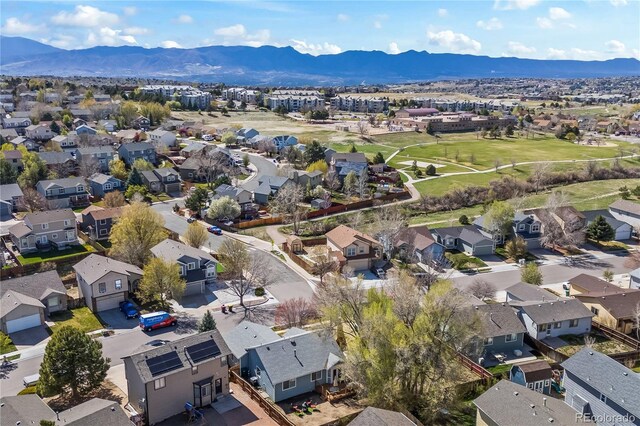 5965 Corinth Dr, Colorado Springs, CO 80923 - aerial perspective of suburban area featuring mountains