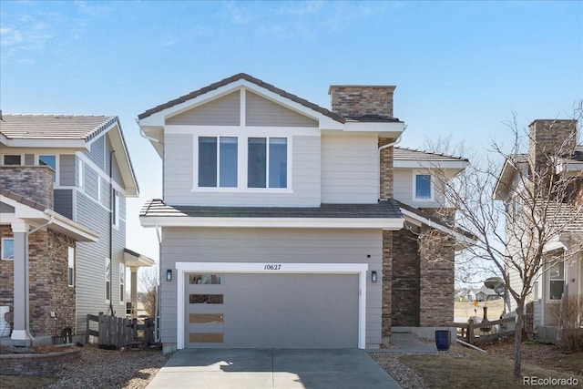 view of front of home featuring driveway and an attached garage