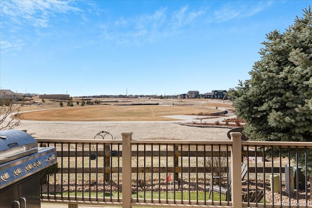 exterior space featuring area for grilling and a rural view