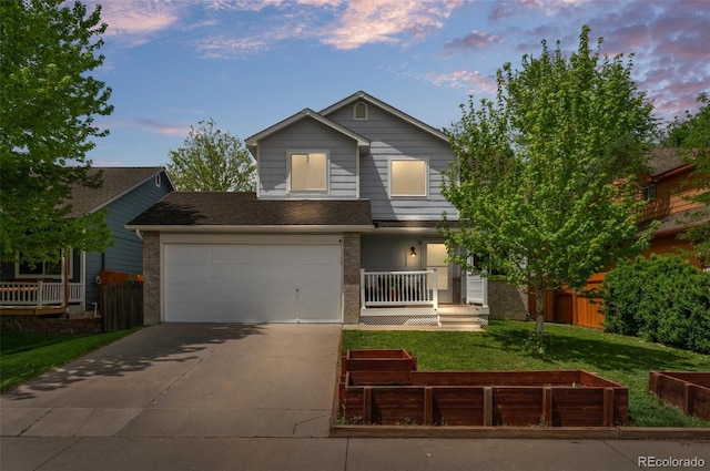13245 Shoshone St, Denver, CO 80234 - view of front of home with driveway, covered porch, brick siding, and a shingled roof