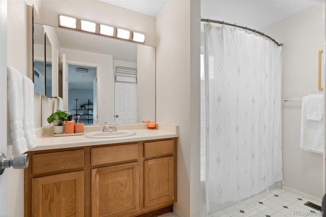 13245 Shoshone St, Denver, CO 80234 - bathroom featuring vanity and shower / bath combo