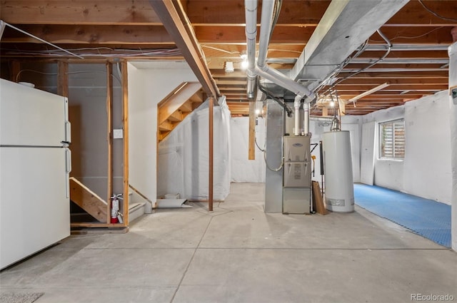 13245 Shoshone St, Denver, CO 80234 - basement with freestanding refrigerator, water heater, and heating unit