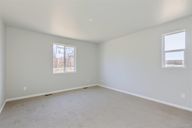 view of carpeted spare room