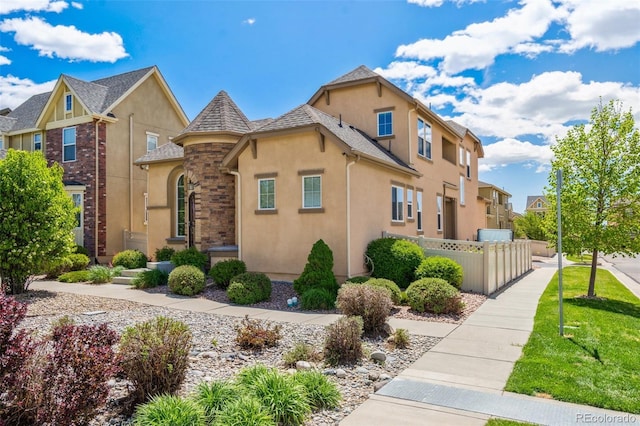 8913 Sunstone Dr, Colorado Springs, CO 80924 - view of front facade featuring stucco siding and a residential view