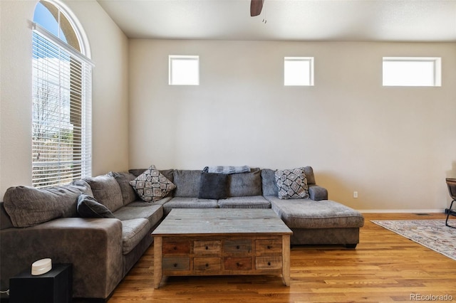 8913 Sunstone Dr, Colorado Springs, CO 80924 - living area featuring wood finished floors, a ceiling fan, and baseboards