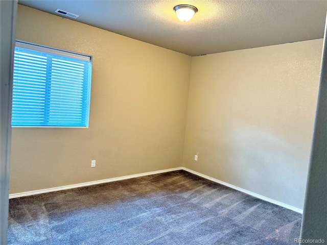 8913 Sunstone Dr, Colorado Springs, CO 80924 - spare room with dark colored carpet and baseboards