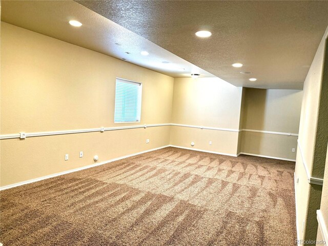 8913 Sunstone Dr, Colorado Springs, CO 80924 - carpeted spare room with recessed lighting, baseboards, and a textured ceiling