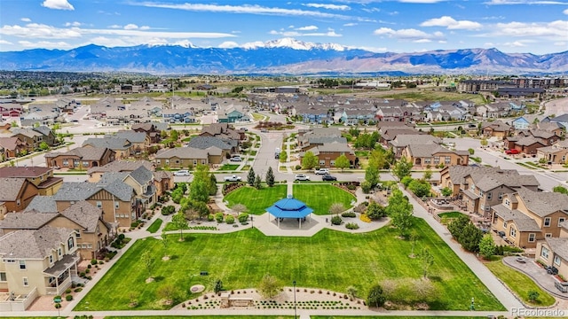 8913 Sunstone Dr, Colorado Springs, CO 80924 - aerial view of residential area featuring a mountainous background