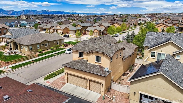 8913 Sunstone Dr, Colorado Springs, CO 80924 - aerial view of residential area featuring a mountainous background
