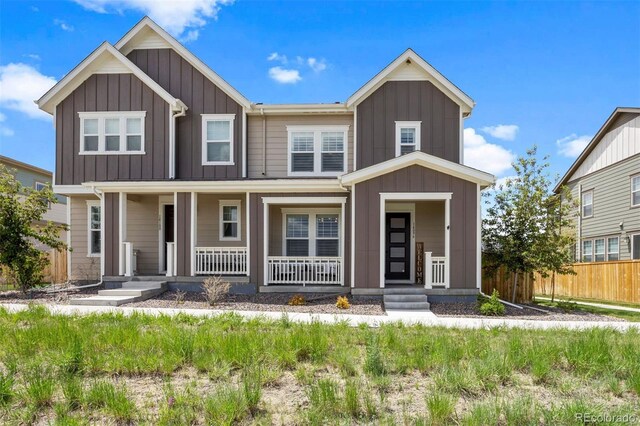 14096 Red Cosmos St, Parker, CO 80134 - view of front facade featuring board and batten siding and covered porch
