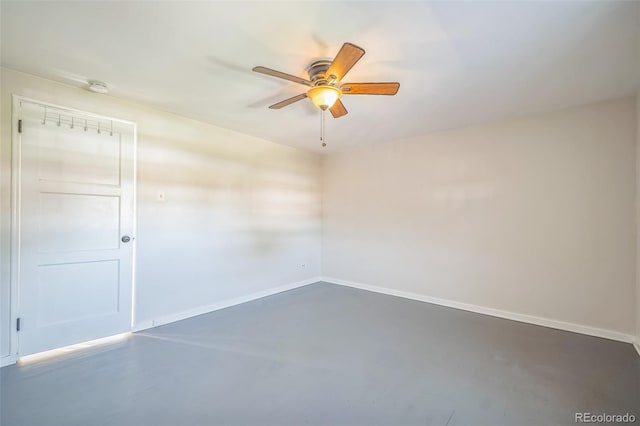 2858 Jasmine St, Denver, CO 80207 - unfurnished room featuring ceiling fan, concrete flooring, baseboards, and a smoke detector