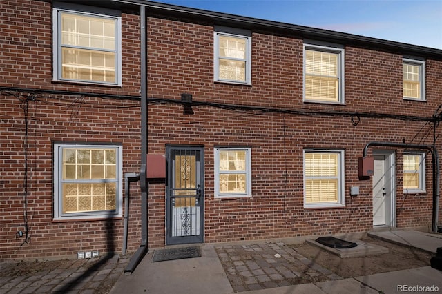 2858 Jasmine St, Denver, CO 80207 - townhome / multi-family property with brick siding