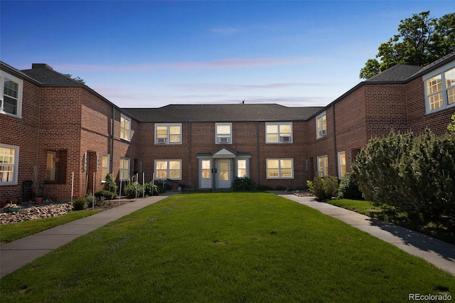 2858 Jasmine St, Denver, CO 80207 - multi unit property featuring a lawn and brick siding