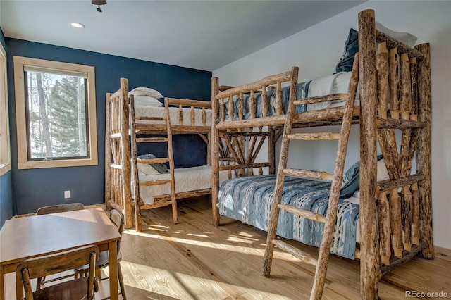 bedroom with wood finished floors