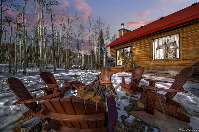 view of snow covered patio