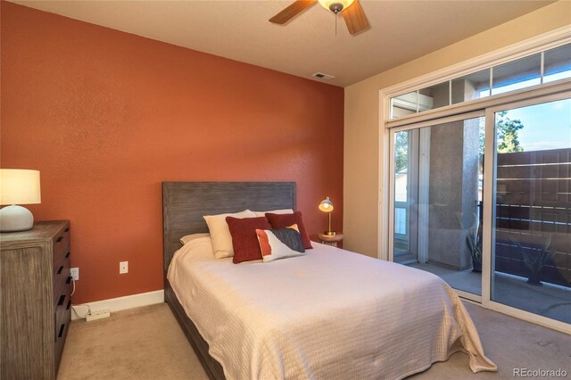 bedroom featuring access to exterior, visible vents, baseboards, carpet, and a ceiling fan