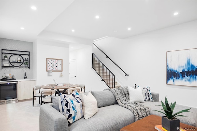 425 S Pearl St, Denver, CO 80209 - living area with bar with sink, stairs, recessed lighting, and wine cooler