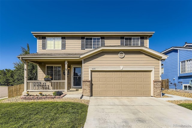 5090 Miriam Ln, Parker, CO 80134 - traditional home featuring covered porch, driveway, an attached garage, and brick siding
