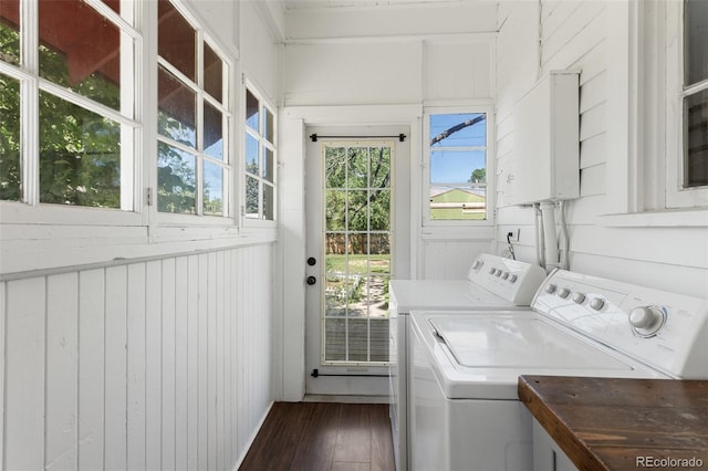 7801 Valley View St, Louviers, CO 80131 - laundry room featuring separate washer and dryer, dark wood-style floors, and cabinet space