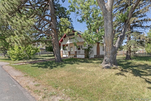 7801 Valley View St, Louviers, CO 80131 - view of front facade featuring covered porch