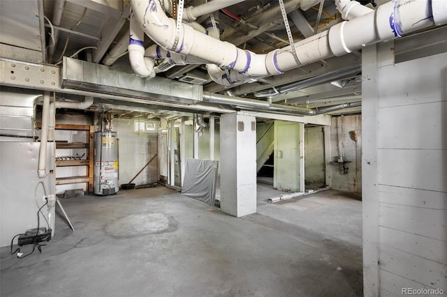 7801 Valley View St, Louviers, CO 80131 - unfinished basement featuring gas water heater