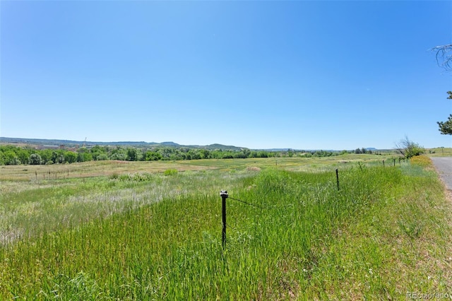 7801 Valley View St, Louviers, CO 80131 - view of yard featuring a rural view