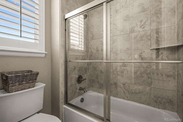 7797 S Valleyhead Way, Aurora, CO 80016 - full bath featuring toilet and enclosed tub / shower combo