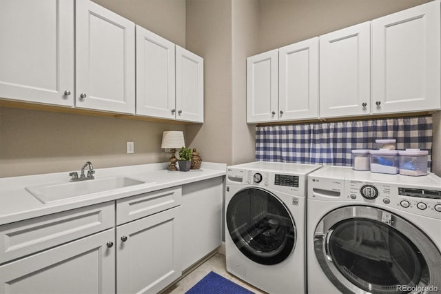 7797 S Valleyhead Way, Aurora, CO 80016 - clothes washing area featuring washing machine and clothes dryer, cabinet space, and a sink