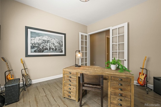 7797 S Valleyhead Way, Aurora, CO 80016 - home office with baseboards and wood finished floors
