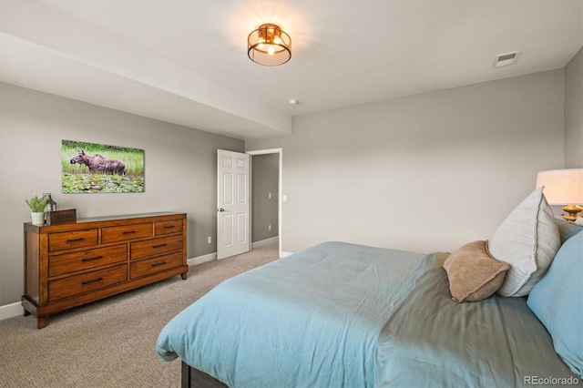 7797 S Valleyhead Way, Aurora, CO 80016 - bedroom with light carpet, baseboards, and visible vents