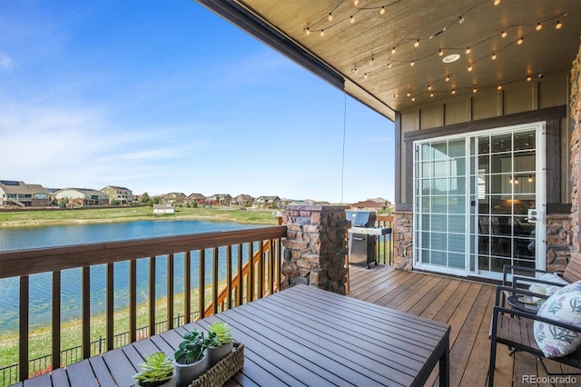 7797 S Valleyhead Way, Aurora, CO 80016 - deck featuring a water view and a residential view