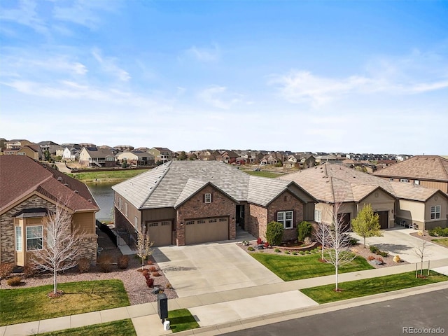 7797 S Valleyhead Way, Aurora, CO 80016 - ranch-style house featuring concrete driveway, brick siding, a residential view, and an attached garage