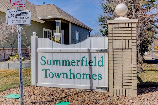 view of community sign