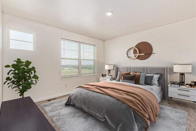 21821 E 7th Ave, Aurora, CO 80018 - bedroom featuring carpet flooring
