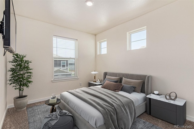 21821 E 7th Ave, Aurora, CO 80018 - carpeted bedroom with baseboards