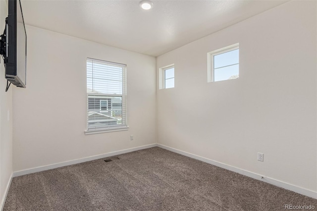 21821 E 7th Ave, Aurora, CO 80018 - unfurnished room with carpet and baseboards