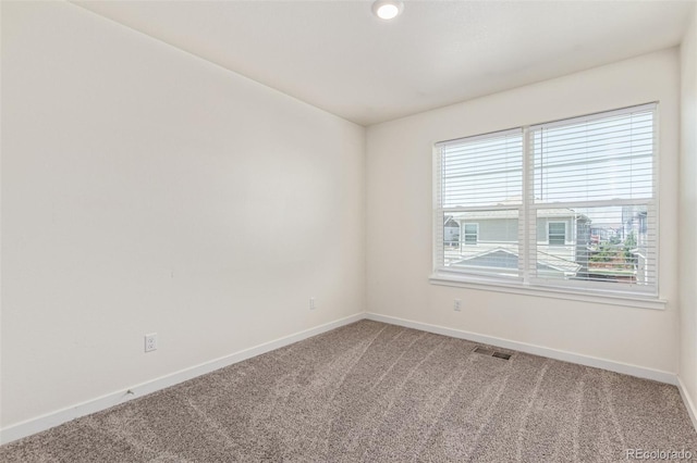 21821 E 7th Ave, Aurora, CO 80018 - empty room with carpet and plenty of natural light