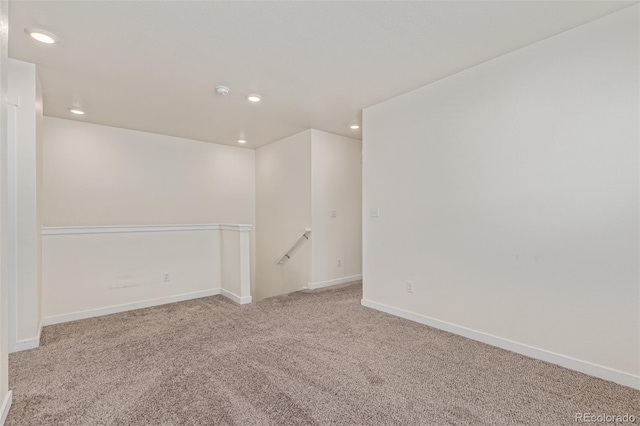 21821 E 7th Ave, Aurora, CO 80018 - carpeted empty room with recessed lighting and baseboards