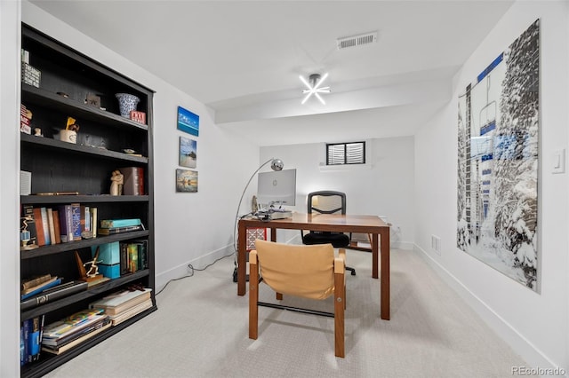 carpeted home office featuring baseboards and visible vents