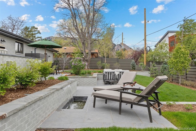 view of patio / terrace featuring a fenced backyard